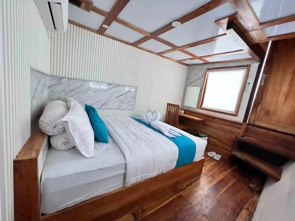 Komodo packing list tip: a soft bag fits easily in a compact liveaboard cabin like this one on Lady Grace